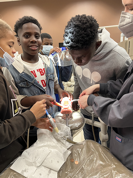 Students in Vidalia-Toombs County participate in a dental assistant training exercise as part of “This Guy Can,” an off-shoot of the “This Girl Can” program. Both programs grew out of work officials from Vidalia-Toombs County did in partnership with the UGA Institute of Government leveraging the updated Georgia Workforce Planning Guide. Photo courtesy Toombs County Family Connection.