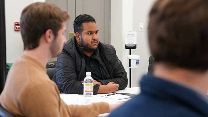 Emanuel Hernaiz, center, and Hendley Jones, left, took part in a recent orientation for a session preparing them for the 2024 Georgia Legislative Internship program. They are among seven University of Georgia undergrads selected as GLIP interns for the 2024 spring semester. (Photo by Sara Ingram, UGA)