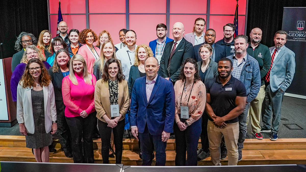 Members of the first cohort of the Data Analysis and Decision Making for Government certificate program pose with the program’s instructors. The cohort graduated at the Developing Data Analytics Capabilities Conference, March 24.