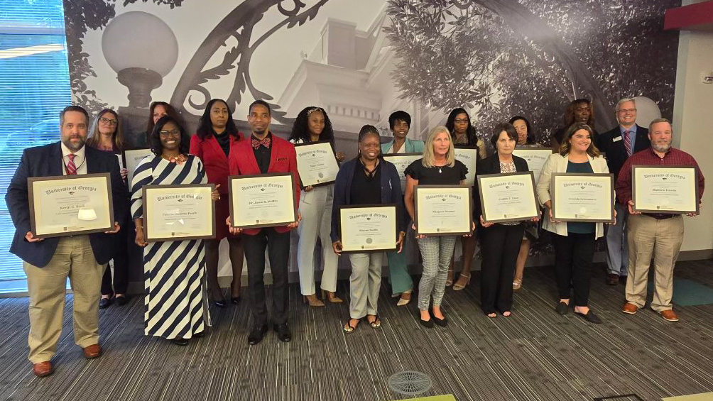 PFLA graduates display their certificates at their recent graduation ceremony. Photo courtesy of Amanda Schoonover. 