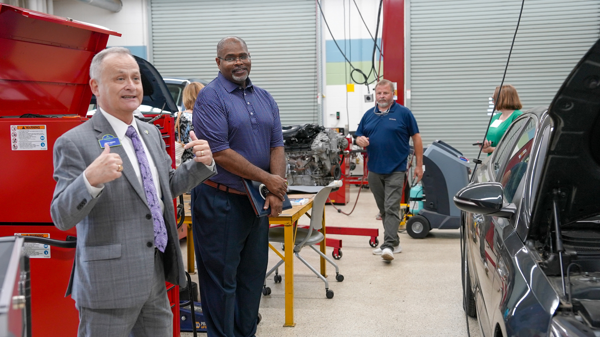 State Director for Georgia USDA Rural Development Reggie Taylor looks on as Coastal Pines Technical College President Lonnie Roberts, left, leads a tour of college’s Baxley campus.