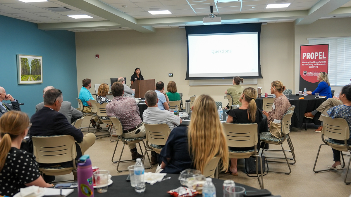 UGA student Andrea Fernando speaks to attendees about her experience as a PROPEL Rural Scholar.