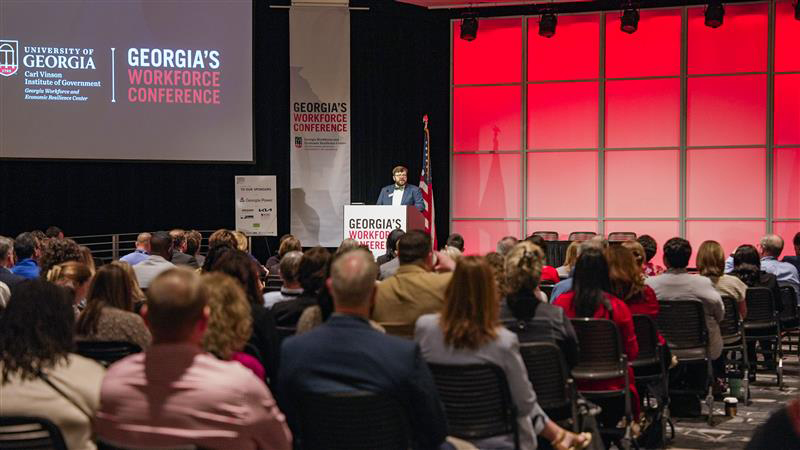 Greg Wilson talks to a room full of people at the Workforce Conference. 