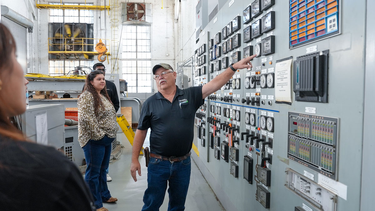 Ronnie Miller, production manager,  leads a tour of the Crisp County Power Commission’s hydroelectric dam on Lake Blackshear.