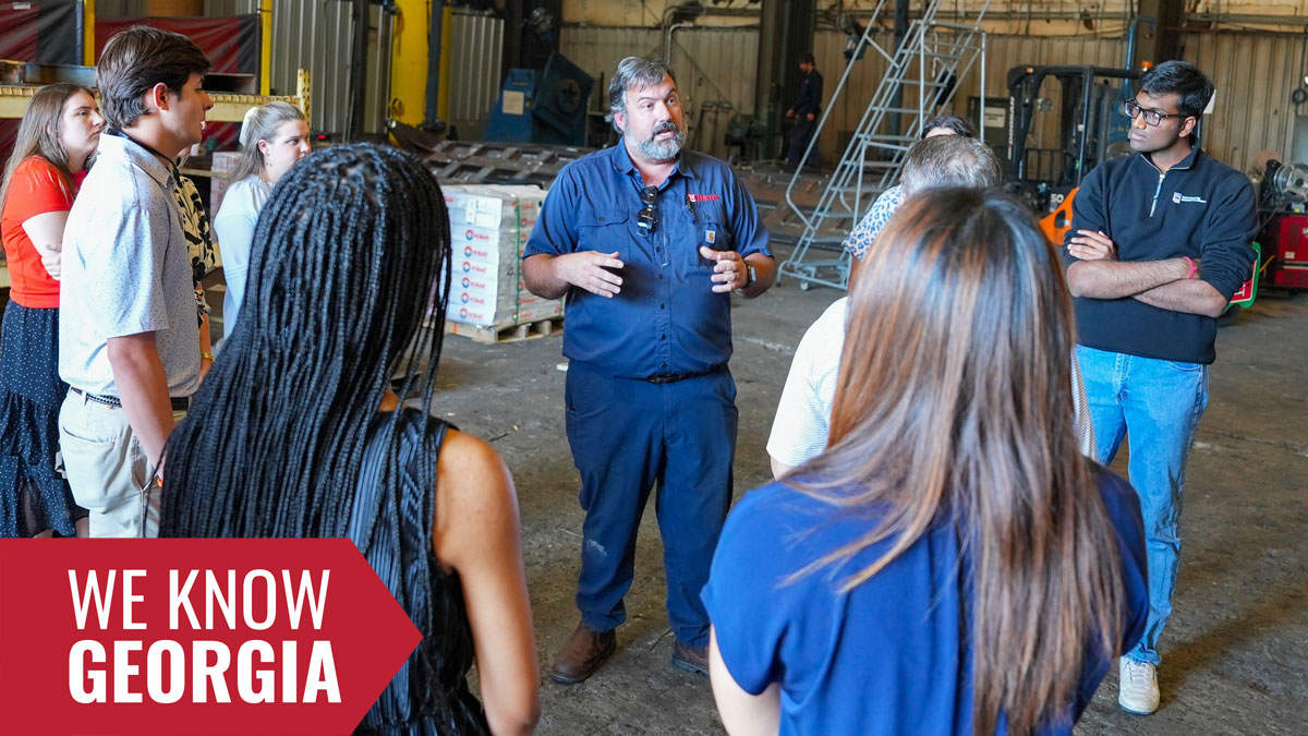 Environmental Health and Safety Manager Brad Dearth, center, speaks to PROPEL Rural Scholars at Harris Equipment in Cordele.