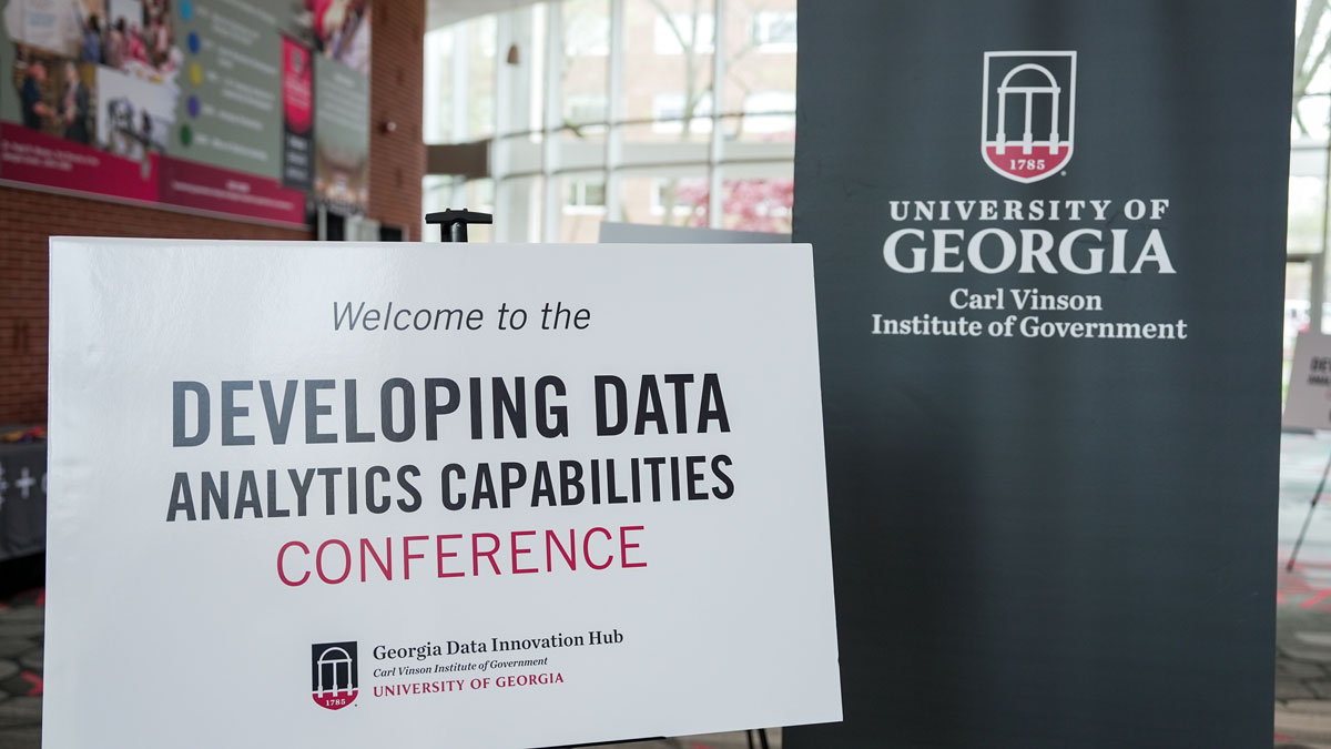 picture of signs at the Developing Data Analytics Capabilities Conference