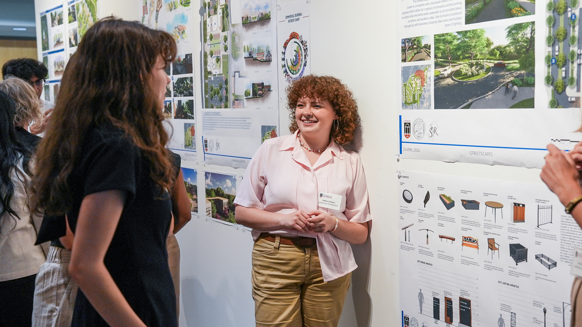 Students discuss designs for the Hutcheson Medical Center site. (Photo by Sara Ingram)