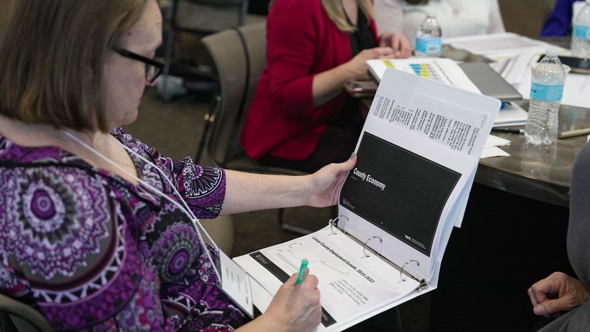 Steering committee members from Franklin, Haralson and Lamar counties reviewed local economic data at the PROPEL kickoff workshop. (Photo by Sara Ingram)