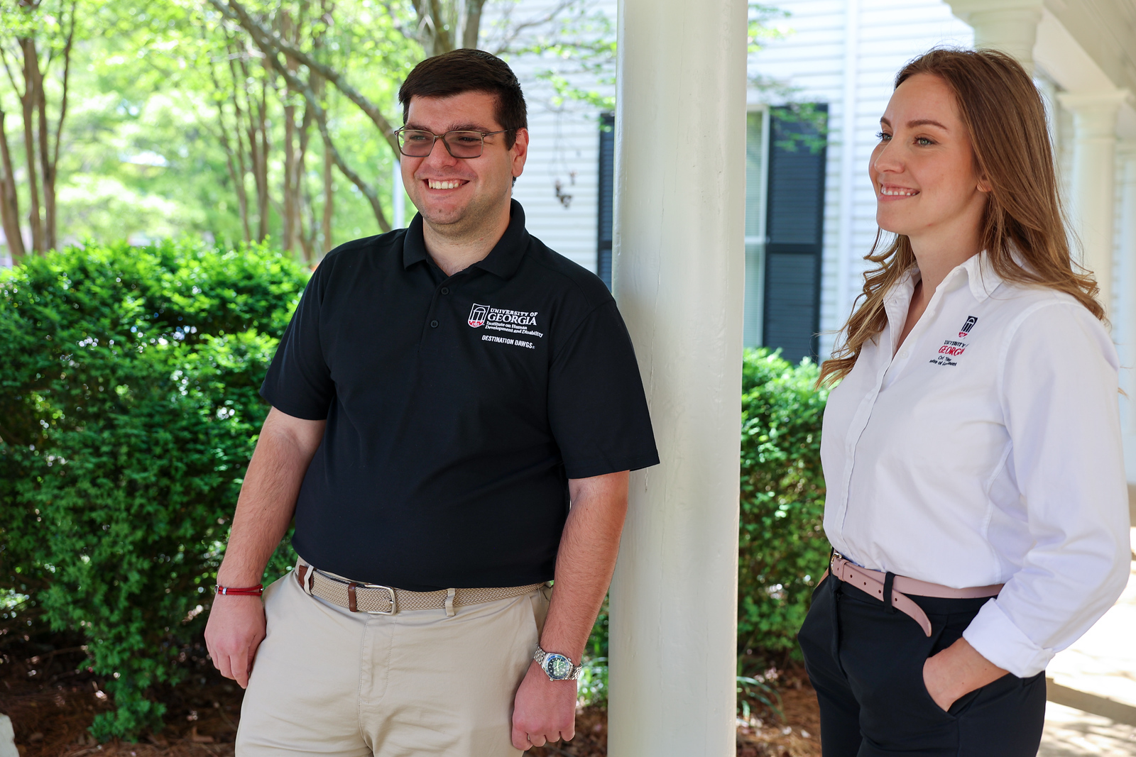 Picture of Ben Harrison and Natalie Bock standing outside.