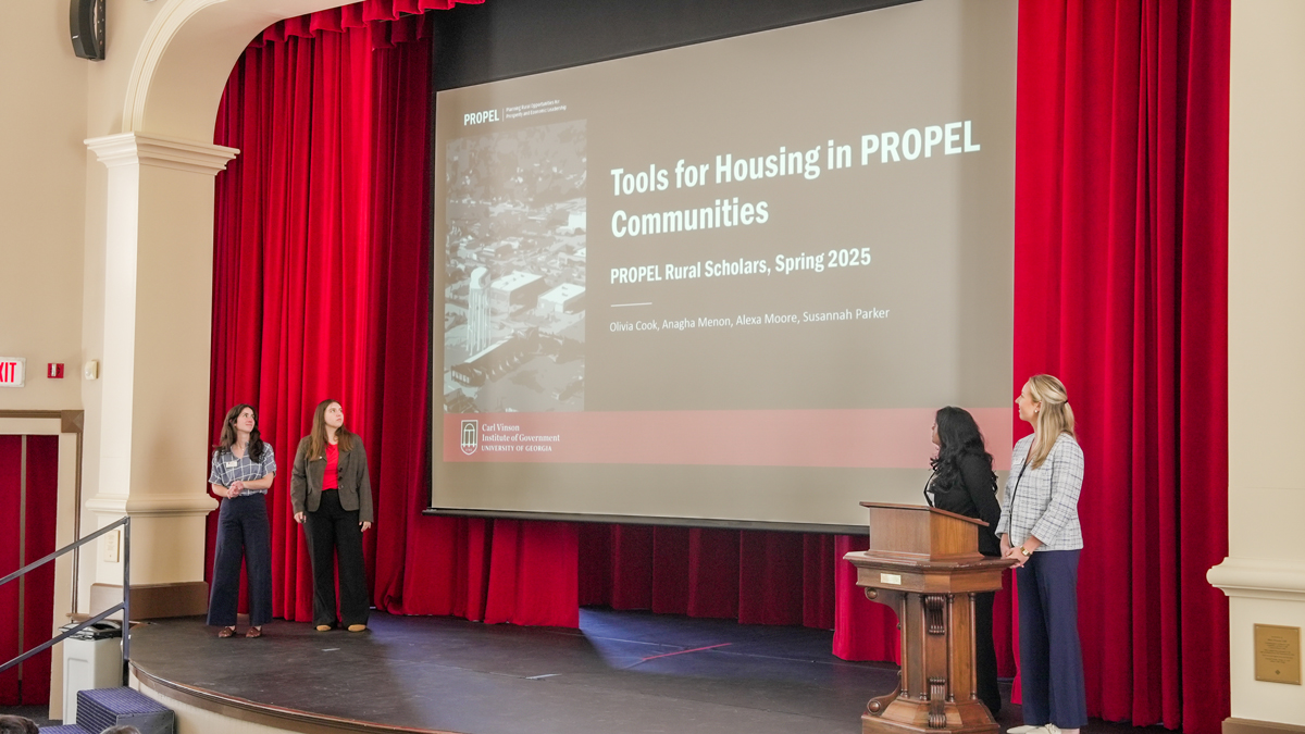 PROPEL Rural Scholars presented their final projects at the UGA Carl Vinson Institute of Government. From left to right, Susannah Parker, Alexa Moore, Anagha Menon and Olivia Cook. (Photo by Sara Ingram)