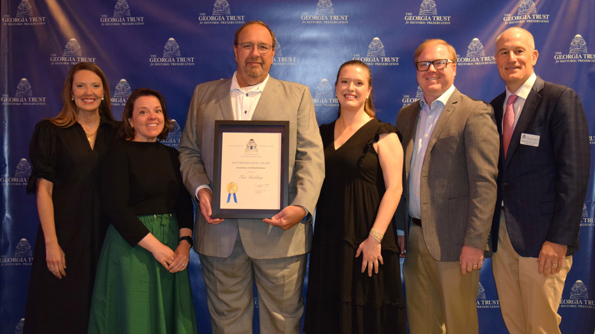 (L-R): Tiffany Alewine, immediate past board chair, Georgia Trust for Historic Preservation; Michelle Garlington, Camp Interiors; building owner Ken Clark and his daughter, Korah Beth Clark; Will Stanford, architect, BTBB Inc., and Wright Mitchell, Georgia Trust President and CEO.