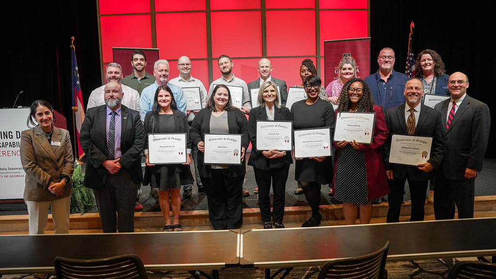 Data Certificate Grads Posing with their Certificates