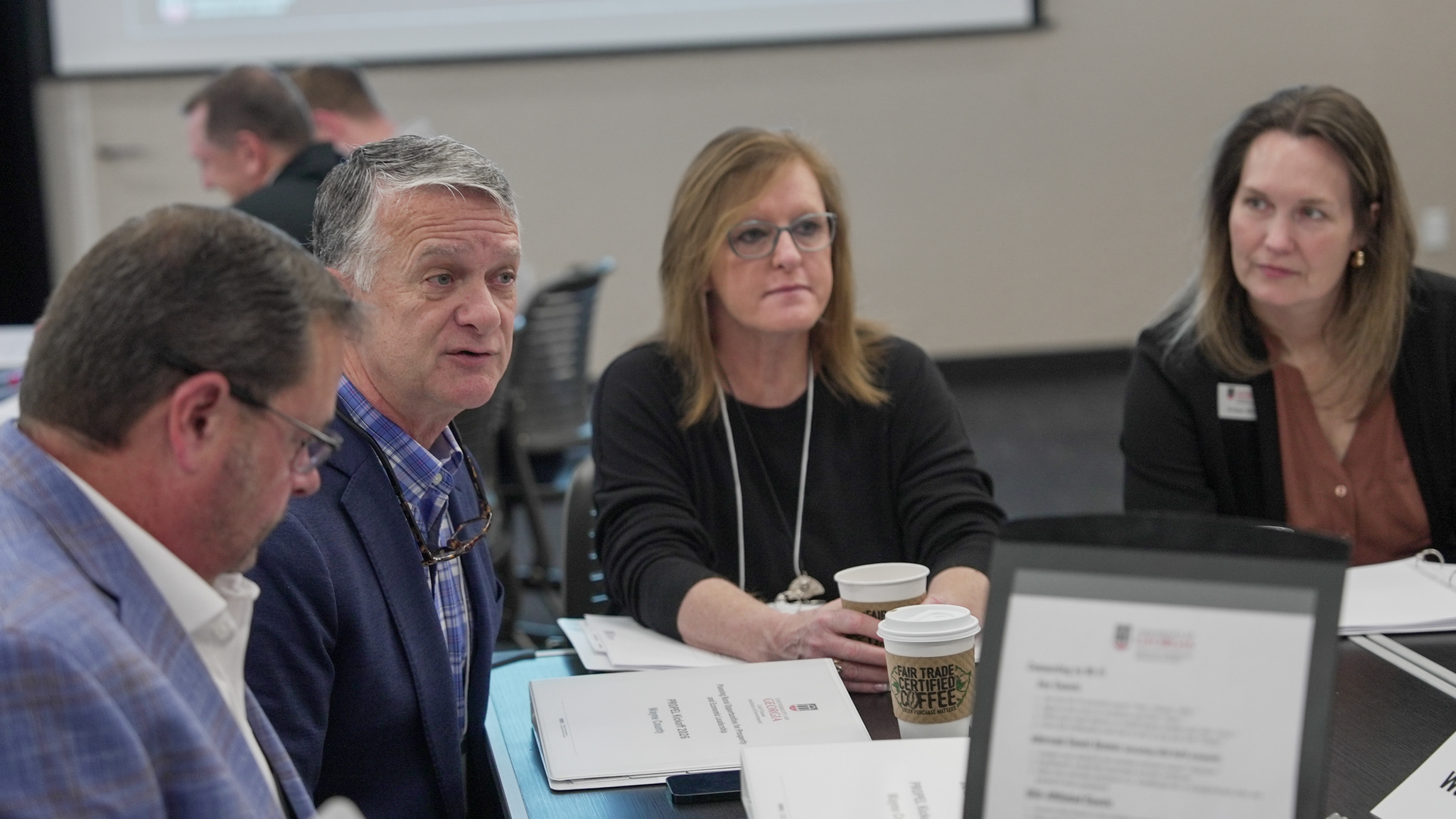 From left, Mark Watson, Jesup Housing Authority executive director; Paul Drawdy, Wayne County administrator; Candee Harris, Wayne County Industrial Development Authority economic development coordinator; and institute faculty member Kristen Miller speak at the PROPEL Kickoff workshop.