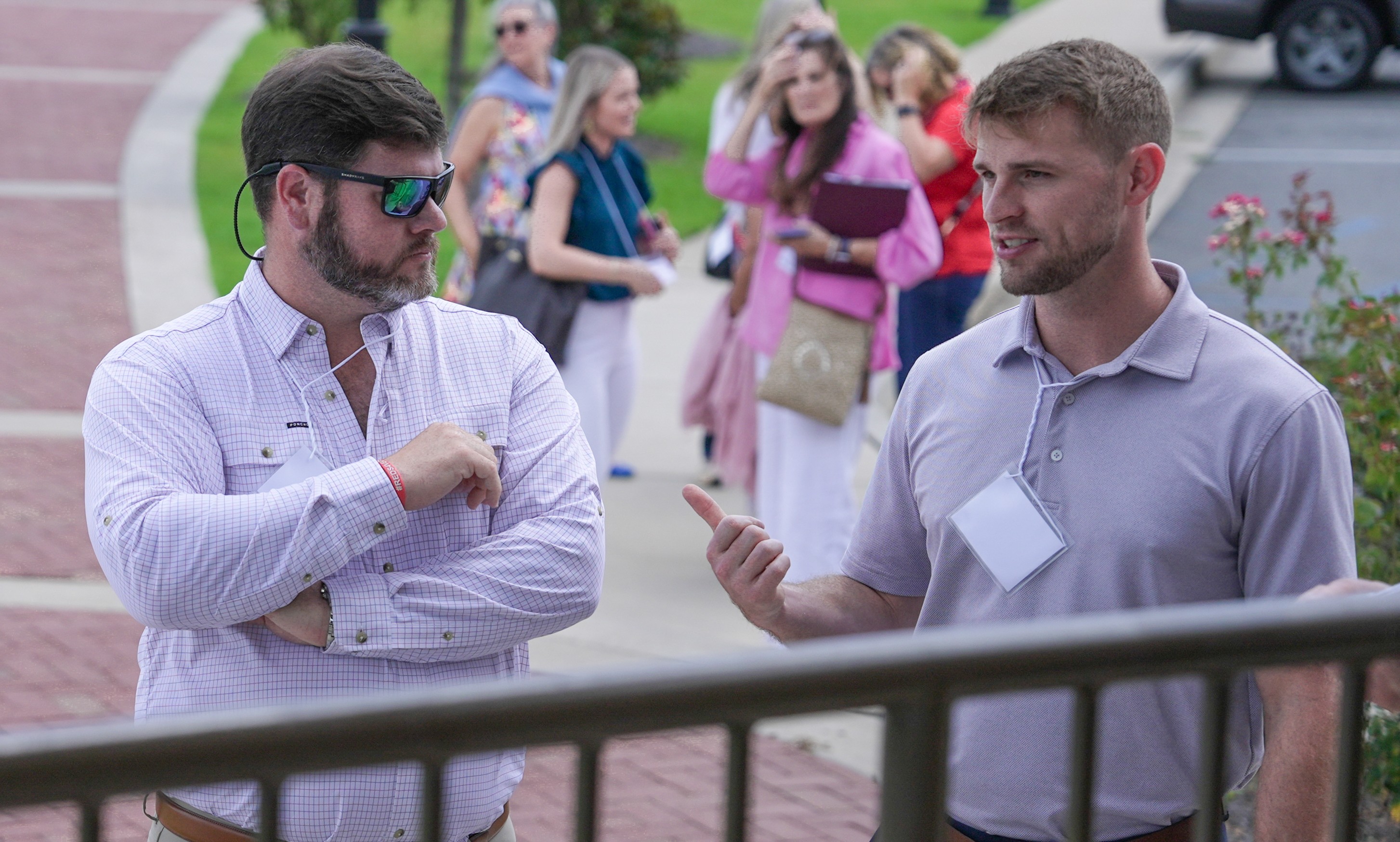 Noah Bishop, sole commissioner of Murray County, and Spencer Page, senior vice president of the Murray County Chamber of Commerce, connect during a tour of the Cordele Railway Park during the PROPEL Ramble this summer.  
