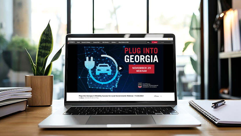 picture of laptop with Plug Into Georgia webinar intro slide